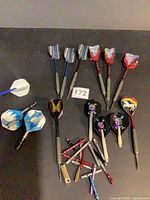 All darts and spare shafts laid out for overview