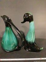 Front view of both ceramic pieces showing colours and shapes