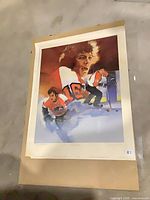 Full view of unframed signed lithograph on paper