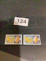 Pair of Canadian 5¢ Meteorology stamps, lot reference number visible