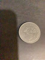 Obverse side of the British Columbia commemorative dollar coin