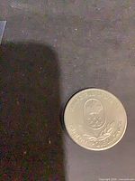 Obverse with Olympic Trust of Canada shield and bilingual legend