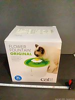 Front view of sealed Catit Flower Fountain Original box