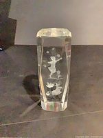 Front view showing entire clear glass block with etched fairy and flowers