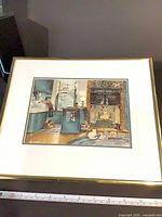 Front view of framed print with mat and gold frame
