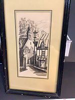 Full view of framed monochrome townscape print