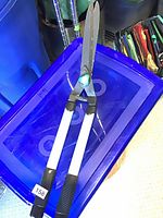 Full view of hedge shears showing blades and handles