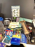 Full lot showing variety of stationery and craft items on desk