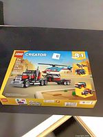 Front of sealed LEGO Creator 3-in-1 Set 31146 box showing truck, helicopter, alternate builds and piece count