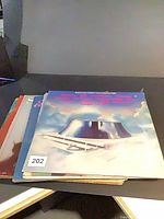 Stack of LP records, top sleeve partially visible