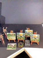 Full lot: cork bottles, five easel tiles, two loose tiles, two paperweights