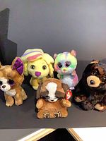 Front view of all five plush toys