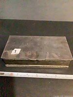 Closed metal jewelry box