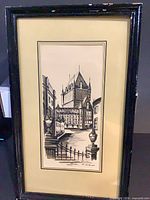 Front view of framed etching showing artwork, mat and frame condition