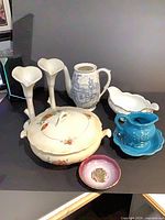 Group shot showing all porcelain and ceramic items in lot