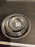 Nested view of all three stainless magnetic trays