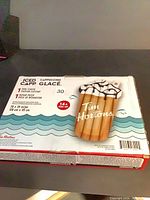 Front of box showing Tim Hortons iced capp pool float image, dimensions, age recommendation