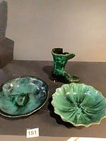 Two bowls and boot-shaped planter showing glaze pattern and form