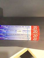 Stack of four Wonder Foil boxes showing product name and 20 sq ft size