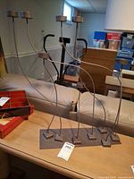 Full view of metal 7-arm candle holder on table