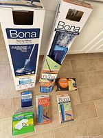 Overall view of all boxed mops, pads and refills