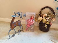 Wood/metal reindeer, boxed striped ornament, wicker basket with fall arrangement