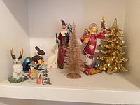 Wide view showing all figurines on shelf