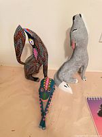 Front view of the three alebrije figurines