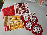 Overview of all stamp items laid out on table