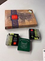 Golden Jubilee proof set box and two Maple Leaf coin boxes