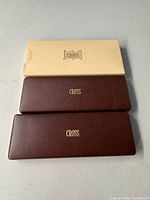 Three Cross pen cases with outer sleeve