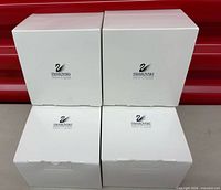 Four unopened Swarovski Silver Crystal boxes