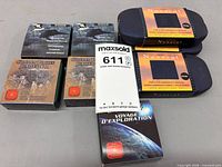 Group shot of all eight boxed coin sets