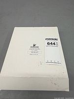 Closed white outer box with Swarovski branding