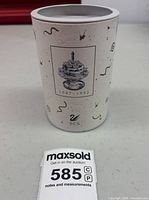 Front view of SCS tube box showing product graphic and dates