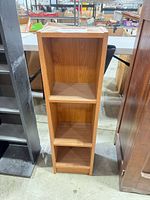 Front view of 3-tier shelf showing tiers and finish
