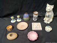 Group shot of all eleven ceramic and stoneware items
