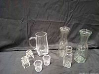 group shot showing all eight clear glass pieces