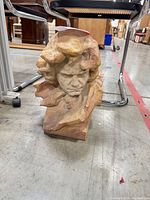 Front view of Beethoven bust sculpture on plinth