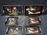 All six trays arranged showing both designs and sizes