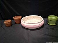 Group shot showing all four planters together