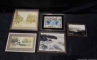 Front view showing all five framed artworks