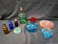 Group shot of all nine colored glass pieces
