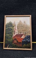Full view of framed country church painting