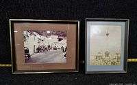 both framed photographs side by side