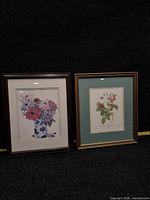Both framed floral prints side by side to show quantity and size relation