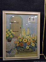 Full view of framed print with tape for scale