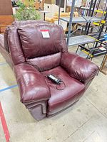 Burgundy leather recliner with power cord