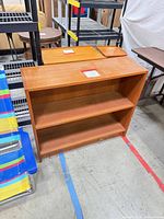 Front view of bookshelf showing shelves and finish