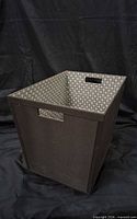 Full view of fabric storage bin showing exterior and interior pattern